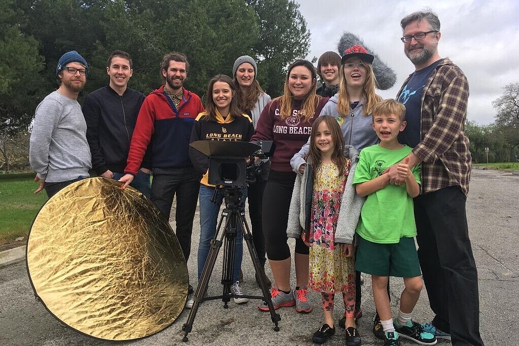 Group of people with film camera