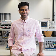 Male student standing in an engineering lab