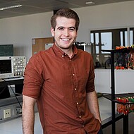 Male student sitting in computer lab