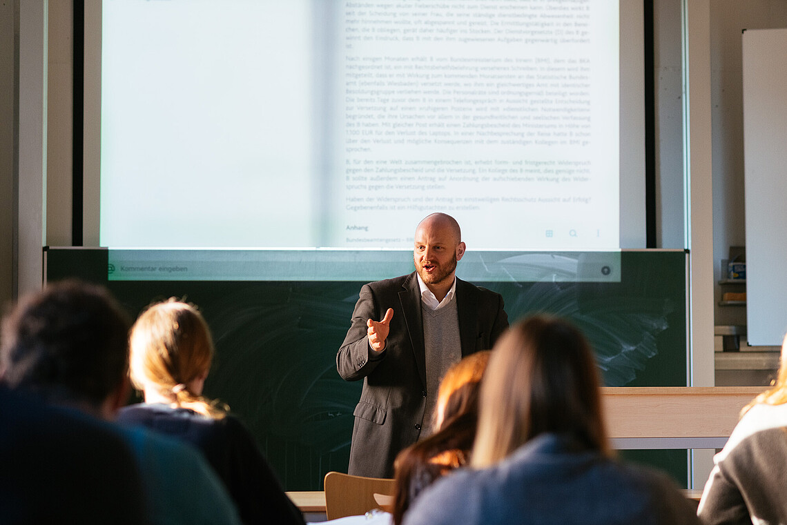 Public Management students in a course taught by instructor Stephan Weiland.